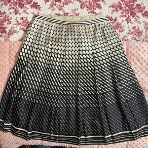 Black and cream pleated skirt